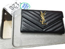 Yves Saint Laurent Cassandre Matelasse Flap Black Wallet