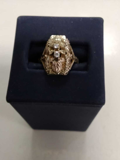 Women's Ring - Tricolor Gold 10k (.417) 3.4 grams Size 20