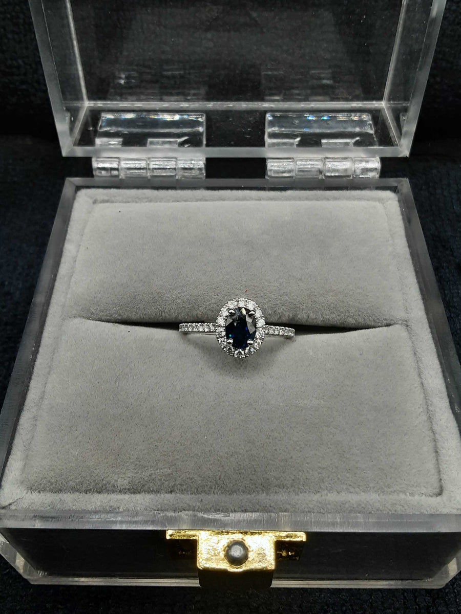 White Gold Woman's Ring With Blue Center Stone